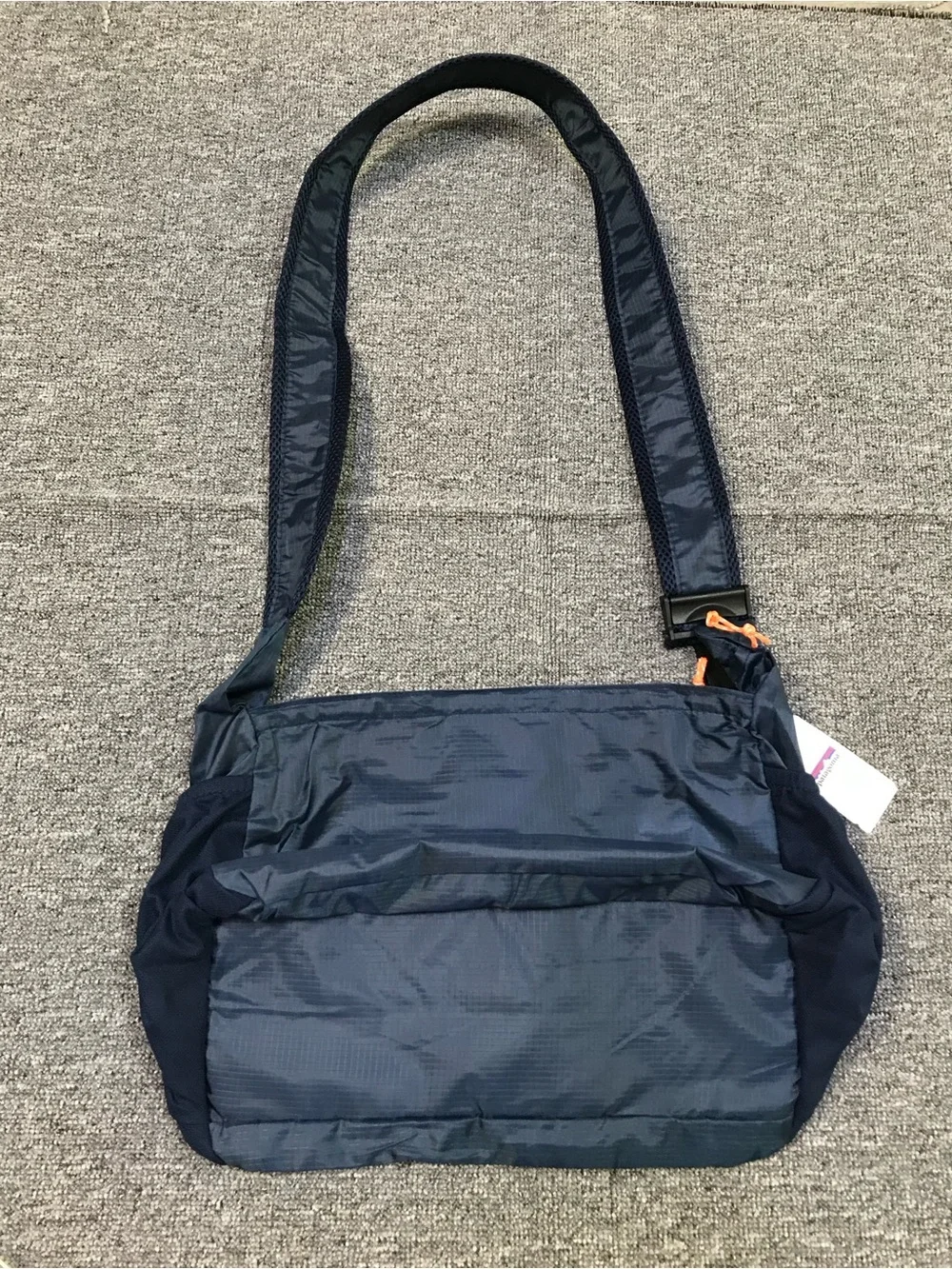 Patagonia Navy Blue Crossbody Travel Bag with Orange Accents